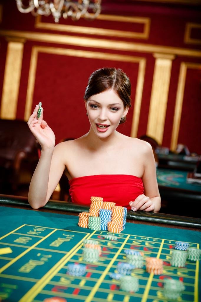 Bikini Paradise slot game interface on lk777 apk showing reels and payline display